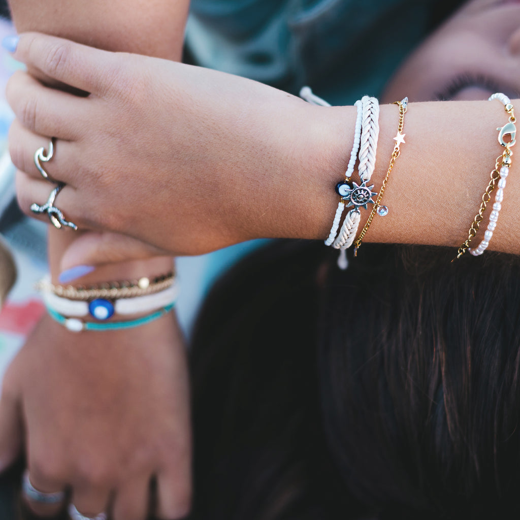 Layered bracelets and rings