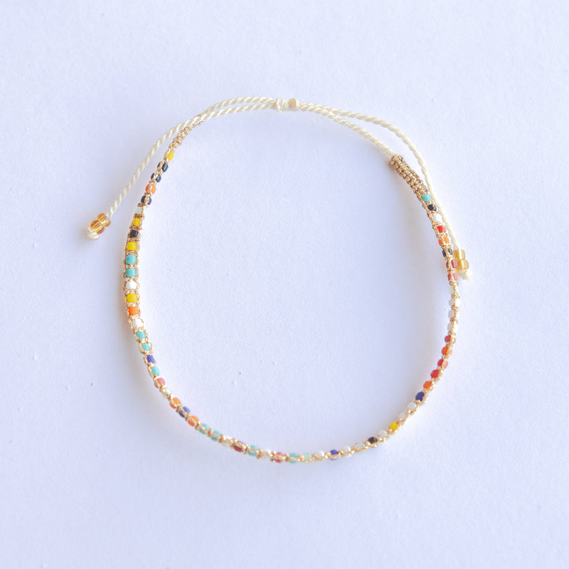 Add a pop of sparkle to your look with our Plating Bead Plain Anklets! These trendy anklets, made with seed beads and a touch of gold, are perfect for layering or wearing solo. Lightweight and durable, they’re an easy addition to your everyday style.