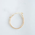Add a pop of sparkle to your look with our Dazzle Beads Adjustable Bracelets! These trendy bracelets, made with seed beads and a touch of gold, are perfect for layering or wearing solo. Lightweight and durable, they’re an easy addition to your everyday style.