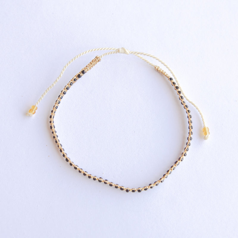 Add a pop of sparkle to your look with our Dazzle Beads Adjustable Bracelets! These trendy bracelets, made with seed beads and a touch of gold, are perfect for layering or wearing solo. Lightweight and durable, they’re an easy addition to your everyday style.