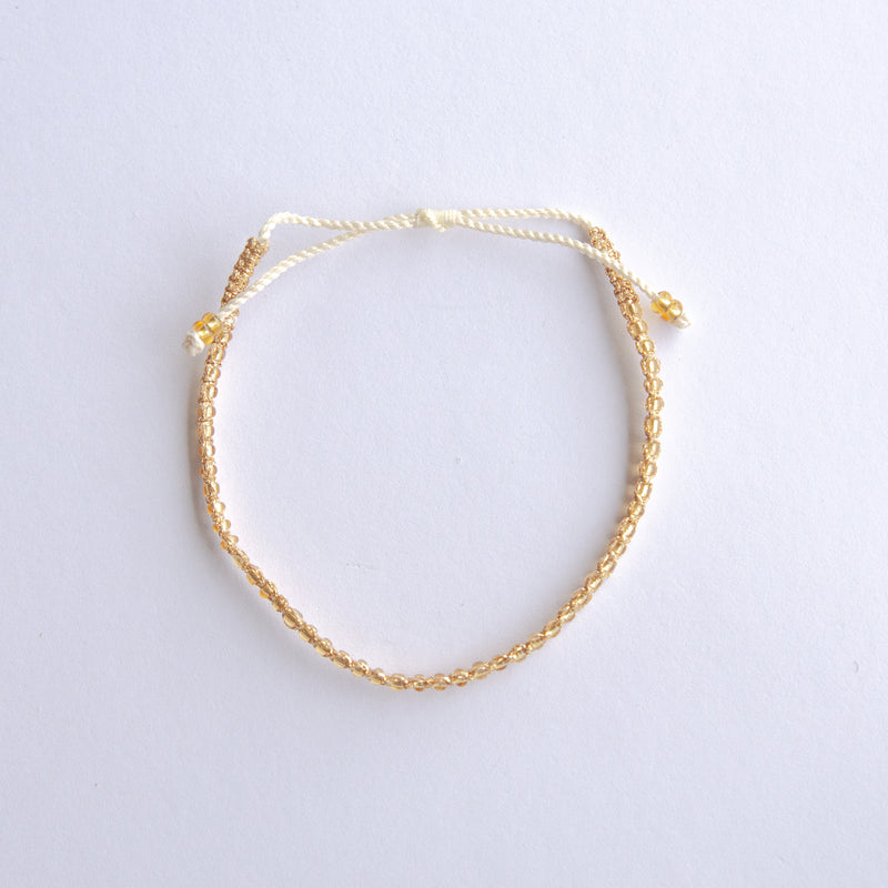 Add a pop of sparkle to your look with our Dazzle Beads Adjustable Bracelets! These trendy bracelets, made with seed beads and a touch of gold, are perfect for layering or wearing solo. Lightweight and durable, they’re an easy addition to your everyday style.