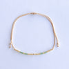 Add a pop of subtle color to your style with our Gleam Beads Adjustable Bracelets. Featuring different colors and gold beads on a silky cotton string, these adjustable bracelets are perfect for layering, with five colors available to create your unique combinations. Lightweight and comfortable, they’re ideal for everyday wear and special occasions alike. Don't forget to check our matchy anklets too!