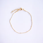 Explore timeless jewelry with our Gold Plated Stainless Steel Sparkle Dots Bracelet. Crafted for durability and style, it's the perfect accessory for any occasion. Get yours today and elevate your look effortlessly. Available also in silver color.