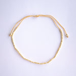 Add a pop of subtle color to your style with our Solo Beads Anklets. Featuring colorful and gold beads on an adjustable nylon string, these anklets are perfect for layering as we have five different colors available. Lightweight and comfortable, they’re ideal for everyday wear and special occasions alike.