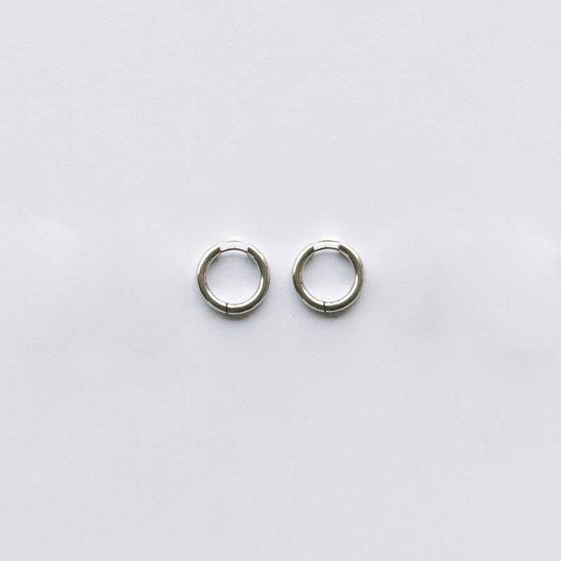 These Classic Hoops are available in both silver and gold and in a range of sizes and widths, so you can create your perfect earring combination. Don't forget to check our thinner version too.