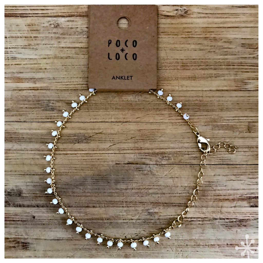 Gold anklet with white beads