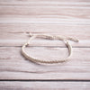 Hand plaited bracelet cotton thin cream