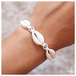 Cowrie shell bracelet cream with silver transparent bead