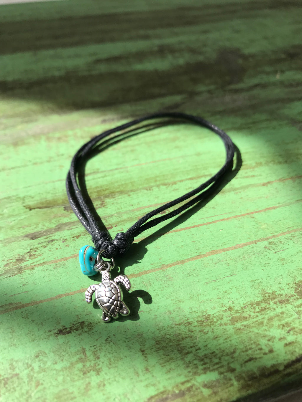Turtle anklet black with turquoise