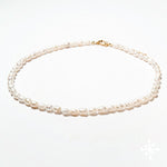 Pearl necklace with gold clasp