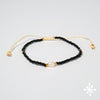 Single pearl bracelet with black beads
