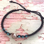 Hand made bracelet with turtle pendant on black cord with blue beads