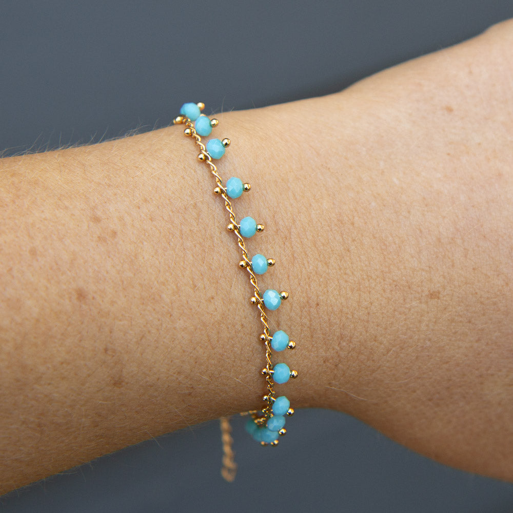 Gold bracelet with blue bohemian beads