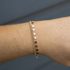 Gold star bracelet with boho charms