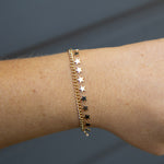 Gold star bracelet with boho charms