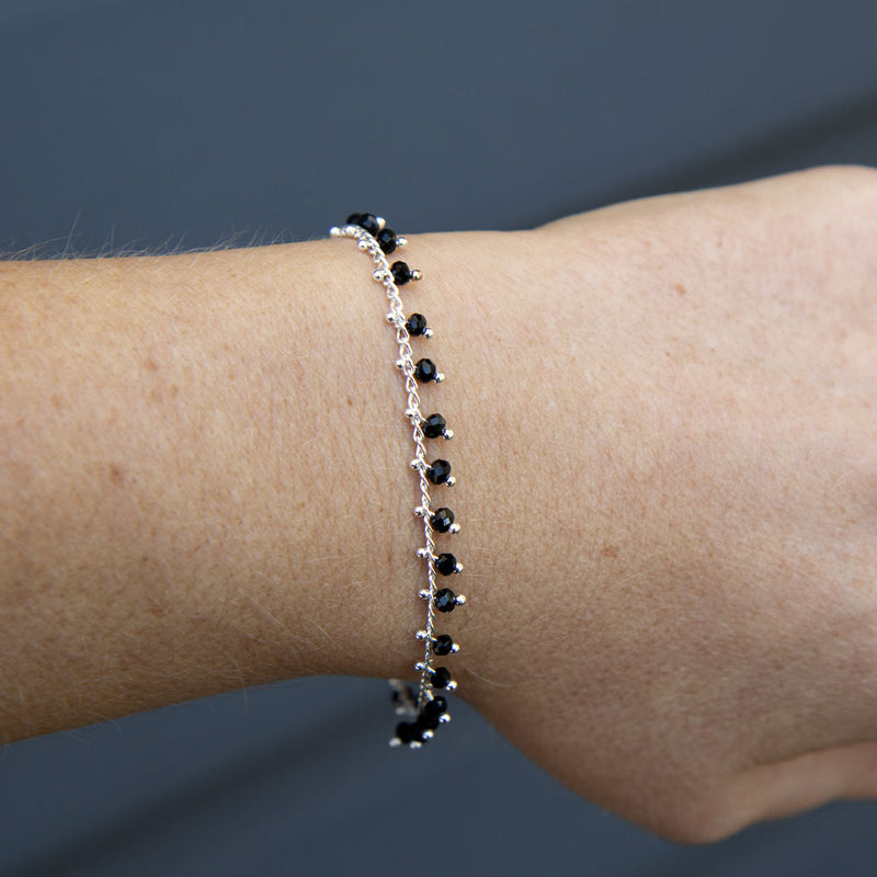Silver bracelet with black bohemian beads