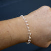 Silver bohemian bracelet with peach beads