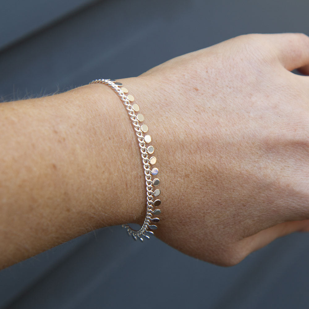 Silver bracelet with mini disc sphere beads