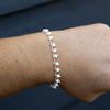 Silver bracelet with white bohemian beads