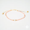 Single pearl bracelet with peach beads
